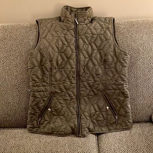 Vest with brown fleece lining and gold accents